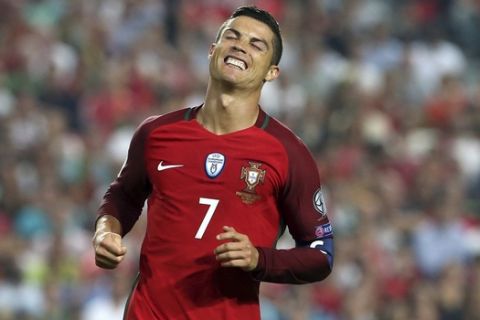 Portugal's Cristiano Ronaldo reacts during the World Cup Group B qualifying soccer match between Portugal and Switzerland at the Luz stadium in Lisbon, Tuesday, Oct. 10, 2017. (AP Photo/Armando Franca)
