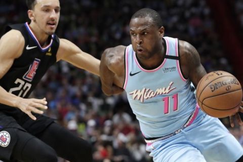 Miami Heat guard Dion Waiters (11) drives to the basket as Los Angeles Clippers guard Landry Shamet (20) defends during the second half of an NBA basketball game, Friday, Jan. 24, 2020, in Miami. (AP Photo/Lynne Sladky)