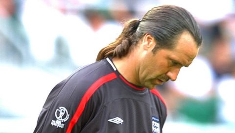 England goalkeeper David Seaman reflects on Brazil's 2nd goal by Ronaldinho for which he was at fault during their 2002 World Cup quarterfinal soccer match, Friday, June 21, 2002, in Shizuoka, Japan. Brazil won the match 2-1. (AP Photo/Dusan Vranic)