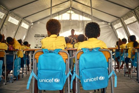 Class 3 students with UNICEF backpacks 