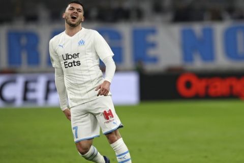 Marseille's Nemanja Radonjic reacts during the French League One soccer match between Marseille and Angers at the Stade Velodrome in Marseille, France, Saturday, Jan. 25, 2020. (AP Photo/Daniel Cole)