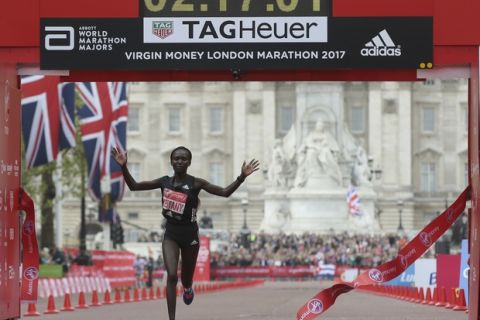 Kenya's Mary Keitany crosses the finish line to win the London Marathon in London on, Sunday, April 23, 2017. (AP Photo/Tim Ireland)