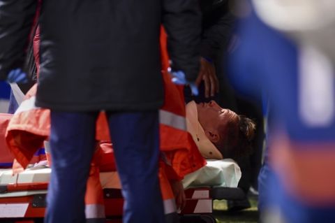 In this photo taken Thursday March 2, 2017, Atletico Madrid's Fernando Torres lies on a stretcher after getting injured during a La Liga soccer match at the Riazor stadium in La Coruna, Spain. Atletico Madrid says Torres has been released from the hospital Friday following the clash of heads with Deportivo La Coruna midfielder Alex Bergantinos. (AP Photo/Carlos Pardellas)