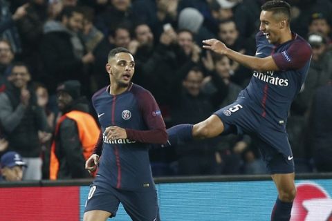 PSG's Layvin Kurzawa, celebrates after scoring his side's forth goal with his teammates PSG's Marquinhos during a Champions League Group B soccer match between Paris Saint-Germain and Anderlecht at Parc des Princes stadium in Paris, France, Tuesday, Oct. 31, 2017. (AP Photo/Thibault Camus)