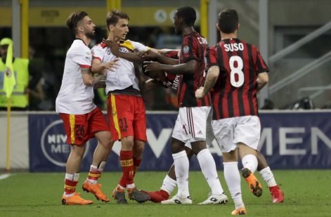 Benevento and AC Milan players talk during a Serie A soccer match between AC Milan and Benevento, at the San Siro stadium in Milan, Italy, Saturday, April 21, 2018. (AP Photo/Luca Bruno)