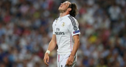 MADRID, SPAIN - MAY 13:  Gareth Bale of Real Madrid reacts after a missed chance on goal during the UEFA Champions League Semi Final, second leg match between Real Madrid and Juventus at Estadio Santiago Bernabeu on May 13, 2015 in Madrid, Spain.  (Photo by Alex Livesey/Getty Images)