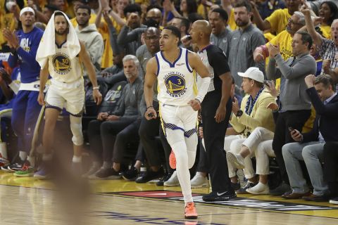 Golden State Warriors guard Jordan Poole (3) runs up the court after scoring against the Boston Celtics during the second half of Game 5 of basketball's NBA Finals in San Francisco, Monday, June 13, 2022. (AP Photo/Jed Jacobsohn)
