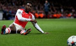 LONDON, ENGLAND - FEBRUARY 25:  Danny Welbeck of Arsenal reacts vafter being brought down by Elderson Uwa Echiejile of Monaco during the UEFA Champions League round of 16, first leg match between Arsenal and Monaco at The Emirates Stadium on February 25, 2015 in London, United Kingdom.  (Photo by Clive Mason/Getty Images)