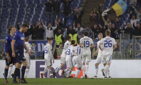 Dynamo Kiev's players celebrate their second goal during the Europa League round of 16, first-leg soccer match between Lazio and Dynamo Kiev at the Olympic stadium, in Rome Thursday, March 8, 2018. (AP Photo/Gregorio Borgia)