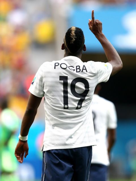 BRASILIA, BRAZIL - JUNE 30:  Paul Pogba of France celebrates scoring his team's first goal during the 2014 FIFA World Cup Brazil Round of 16 match between France and Nigeria at Estadio Nacional on June 30, 2014 in Brasilia, Brazil.  (Photo by Jeff Gross/Getty Images)