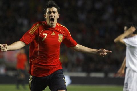 Spain national team player David Villa celebrates after scoring against Italy during an exhibition soccer match, at the Martinez Valero stadium in Elche, Spain, Wednesday, March 26, 2008.  (AP Photo/Alessandra Tarantino)