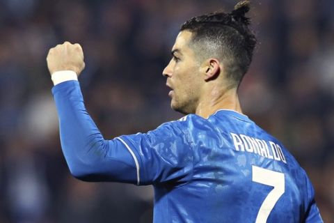 Juventus' Cristiano Ronaldo celebrates scoring his side's first goal, during an Italian Serie A soccer match between Spal and Juventus at the Paolo Mazza stadium in Ferrara, Italy, Saturday, Feb. 22, 2020. (Filippo Rubin/LaPresse via AP)