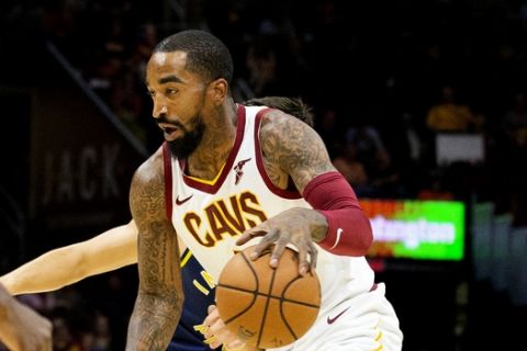 FILE - In this Oct. 8, 2018, file photo, Cleveland Cavaliers guard J.R. Smith dribbles to the basket during the first quarter of a preseason NBA basketball game against the Indiana Pacers in Cleveland. The Cavaliers waived Smith, ending his eventful tenure with the team. Cleveland tried to trade Smith, but could not find the right package and released him to cut space under the salary cap and avoid paying any luxury taxes. (AP Photo/Scott R. Galvin, File)