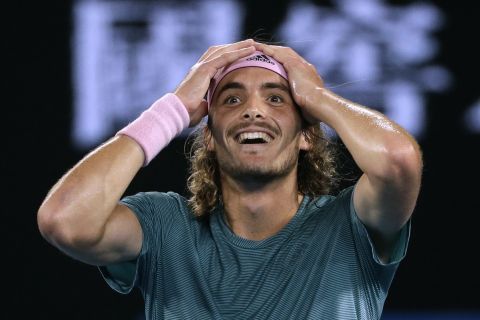 FILE  - In this Jan. 20, 2019, file photo, Greece's Stefanos Tsitsipas celebrates after defeating Switzerland's Roger Federer in their fourth round match at the Australian Open tennis championships in Melbourne, Australia. Of particular interest is when a new face will emerge from the crop of 20-somethings who have been rising in the rankings. (AP Photo/Mark Schiefelbein, File)