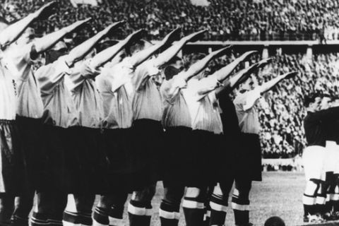 Before a record crowd of over one hundred thousand people who filled the Olympic stadium to capacity, the English football team give the Nazi salute in this May 14th, 1938, file photo. England beat Germany 6-3. (AP PHOTO).