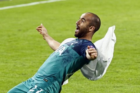 Tottenham's Lucas Moura celebrates in front of the fans at the end of the Champions League semifinal second leg soccer match between Ajax and Tottenham Hotspur at the Johan Cruyff ArenA in Amsterdam, Netherlands, Wednesday, May 8, 2019. (AP Photo/Peter Dejong)