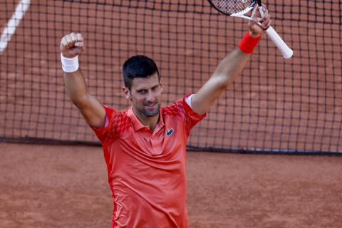 Serbia's Novak Djokovic celebrates winning his quarterfinal match of the French Open tennis tournament against Russia's Karen Khachanov in four sets, 4-6, 7-6 (7-0), 6-2, 6-4, at the Roland Garros stadium in Paris, Tuesday, June 6, 2023. (AP Photo/Jean-Francois Badias)