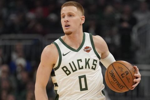 Milwaukee Bucks' Donte DiVincenzo drives during the first half of an NBA basketball game against the Chicago Bulls Thursday, Nov. 14, 2019, in Milwaukee. (AP Photo/Morry Gash)