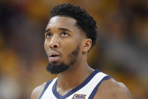 Utah Jazz guard Donovan Mitchell (45) looks on in the first half of Game 4 of an NBA basketball first-round playoff series against the Dallas Mavericks Saturday, April 23, 2022, in Salt Lake City. (AP Photo/Rick Bowmer)