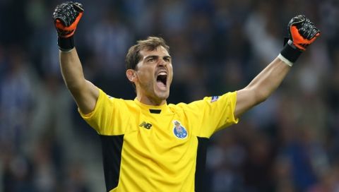 Porto goalkeeper Iker Casillas celebrates at the end of the Champions League group G soccer match between FC Porto and Chelsea FC at the Dragao stadium in Porto, Portugal, Tuesday, Sept. 29, 2015.  Porto won 2-1. (AP Photo/Steven Governo)