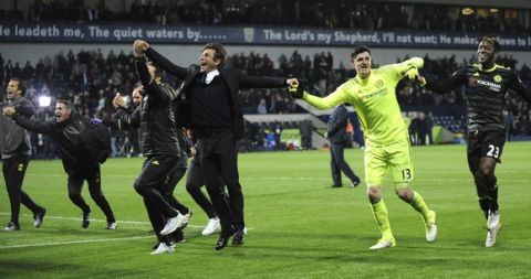Chelsea's manager Antonio Conte celebrates with players after the English Premier League soccer match between West Bromwich Albion and Chelsea, at the Hawthorns in West Bromwich, England, Friday, May 12, 2017. Chelsea won the match 0-1 meaning they win the Premiership title. (AP Photo/Rui Vieira)