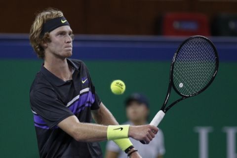 Andrey Rublev of Russia reacts as he plays against Alexander Zverev of Germany during the men's singles match at the Shanghai Masters tennis tournament at Qizhong Forest Sports City Tennis Center in Shanghai, China, Thursday, Oct. 10, 2019. (AP Photo/Andy Wong)