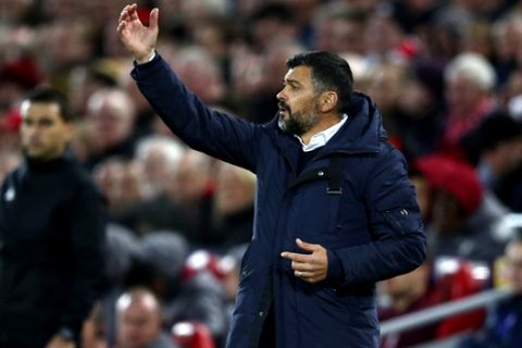 Porto coach Sergio Conceicao gestures during the Champions League quarterfinal, first leg, soccer match between Liverpool and FC Porto at Anfield Stadium, Liverpool, England, Tuesday April 9, 2019. (AP Photo/Dave Thompson)