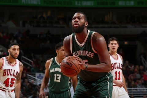 CHICAGO, IL - DECEMBER 16: Greg Monroe #15 of the Milwaukee Bucks shoots a free throw against the Chicago Bulls on December 16, 2016 at the United Center in Chicago, Illinois. NOTE TO USER: User expressly acknowledges and agrees that, by downloading and or using this Photograph, user is consenting to the terms and conditions of the Getty Images License Agreement. Mandatory Copyright Notice: Copyright 2016 NBAE (Photo by Gary Dineen/NBAE via Getty Images)