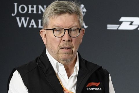 Ross Brawn, Formula One Managing Director of Motorsports, wears a black armband after the death of FIA Formula One Race Director Charlie Whiting, during a press conference at the Australian Grand Prix in Melbourne, Australia, Friday, March 15, 2019. The first race of the year is Sunday. (AP Photo/Andy Brownbill)