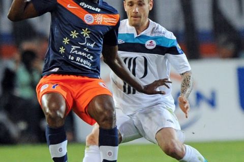 Montpellier's Defender John Utaka (L) vies with Lille 's Mathieu Debuchy (R) during the French L1 football match, Montpellier vs Lille on May 13, 2012 at the Mosson stadium in the French southern city Montpellier.    AFP PHOTO / PASCAL GUYOTPASCAL GUYOT/AFP/GettyImages