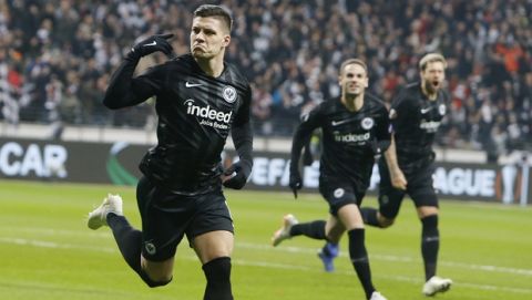 Frankfurt's Luka Jovic celebrates his side's opening goal during a Europa League group H soccer match between Eintracht Frankfurt and Olympique Marseille in Frankfurt, Germany, Thursday, Nov. 29, 2018. (AP Photo/Michael Probst)
