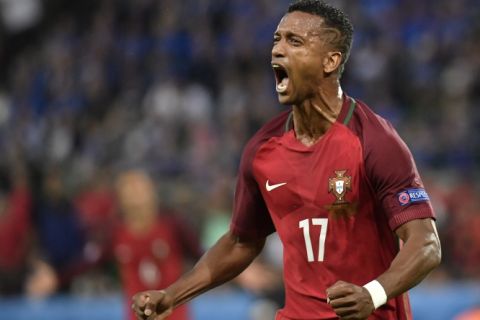 Portugal's forward Nani celebrates the team's first goal during the Euro 2016 group F football match between Portugal and Iceland at the Geoffroy-Guichard stadium in Saint-Etienne on June 14, 2016. / AFP / jeff pachoud        (Photo credit should read JEFF PACHOUD/AFP/Getty Images)
