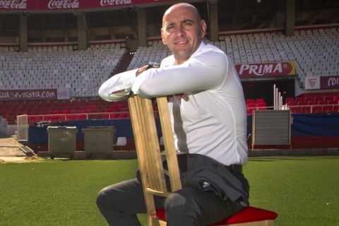 In this Thursday, Oct. 6, 2011 photo, Ramon Rodriguez Verdejo "Monchi" poses for a photo at the Ramon Sanchez Pizjuan stadium, in Seville, Spain. Verdejo, who still goes by the nickname from his goalkeeping days, has become one of the most sought-after football directors in European soccer after revolutionizing Spanish club Sevilla with a scouting system that helped rescue the team from the brink of financial collapse and turned it into a perennial contender in the continents second-tiered competitions. (AP Photo/Miguel Angel Morenatti)