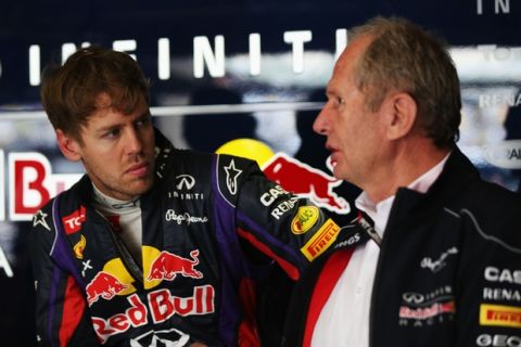 SHANGHAI, CHINA - APRIL 12:  Sebastian Vettel of Germany and Infiniti Red Bull Racing talks with Red Bull Motorsport Consultant Dr Helmut Marko as he prepares to drive during practice for the Chinese Formula One Grand Prix at the Shanghai International Circuit on April 12, 2013 in Shanghai, China.  (Photo by Mark Thompson/Getty Images) *** Local Caption *** Sebastian Vettel; Helmut Marko