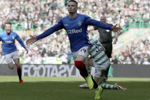Rangers' Ryan Kent celebrates scoring his side's first goal of the game against Celtic during their Scottish Premiership soccer match at Celtic Park in Glasgow, Scotland, Sunday March 31, 2019. (Andrew Milligan/PA via AP)