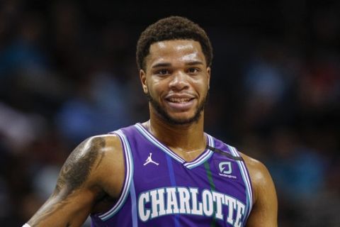 Charlotte Hornets forward Miles Bridges stands on the court against the Brooklyn Nets in the second half of an NBA basketball game in Charlotte, N.C., Saturday, Feb. 22, 2020. Brooklyn won 115-86. (AP Photo/Nell Redmond)
