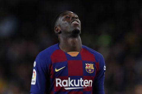 Barcelona's Ousmane Dembele reacts during Spanish La Liga soccer match between Barcelona and Celta at the Camp Nou stadium in Barcelona, Span, Nov. 9, 2019. (AP Photo/Joan Monfort)