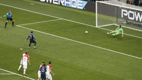 France's Antoine Griezmann scores his side' second goal from the penalty spot during the final match between France and Croatia at the 2018 soccer World Cup in the Luzhniki Stadium in Moscow, Russia, Sunday, July 15, 2018. (AP Photo/Rebecca Blackwell)