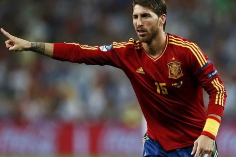 Spain's Sergio Ramos reacts during their Euro 2012 quarter-final soccer match against France at Donbass Arena in Donetsk, June 23, 2012. REUTERS/Charles Platiau (UKRAINE  - Tags: SPORT SOCCER)  