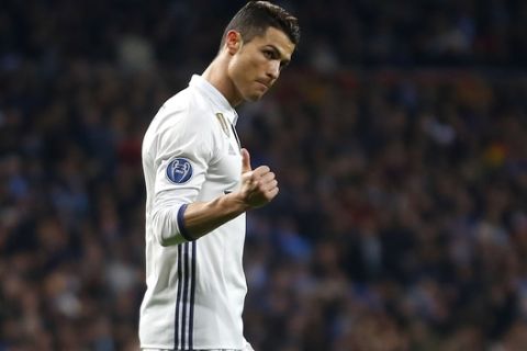 Real Madrid's Cristiano Ronaldo gestures during the Champions League round of 16, first leg, soccer match between Real Madrid and Napoli at the Santiago Bernabeu stadium in Madrid, Wednesday Feb. 15, 2017. (AP Photo/Francisco Seco)