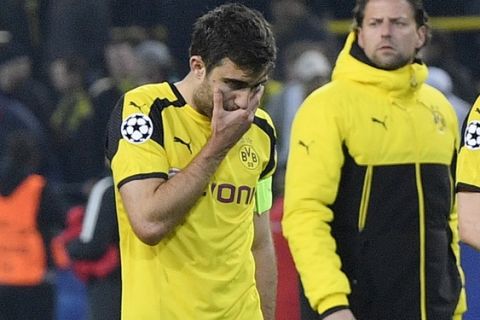 Dortmund's Sokratis Papastathopoulos, Roman Weidenfeller, Matthias Ginter and Julian Weigl, from left, react after losing 2-3 during the Champions League quarterfinal first leg soccer match between Borussia Dortmund and AS Monaco in Dortmund, Germany, Wednesday, April 12, 2017. (AP Photo/Martin Meissner)
