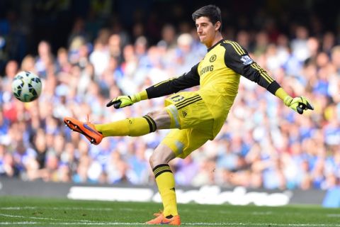 Chelsea's Belgian goalkeeper Thibaut Courtois kicks a clearance during the English Premier League football match between Chelsea and Liverpool at Stamford Bridge in London on May 10, 2015. AFP PHOTO / GLYN KIRK

RESTRICTED TO EDITORIAL USE. No use with unauthorized audio, video, data, fixture lists, club/league logos or live services. Online in-match use limited to 45 images, no video emulation. No use in betting, games or single club/league/player publications.        (Photo credit should read GLYN KIRK/AFP/Getty Images)