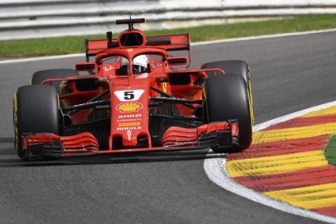 Ferrari driver Sebastian Vettel of Germany steers his car during the first practice session ahead of the Belgian Formula One Grand Prix in Spa-Francorchamps, Belgium, Friday, Aug. 24, 2018. (AP Photo/Geert Vanden Wijngaert)