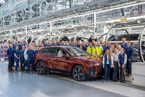 Employees and management celebrating 12 millionth BMW produced at BMW plant Dingolfing