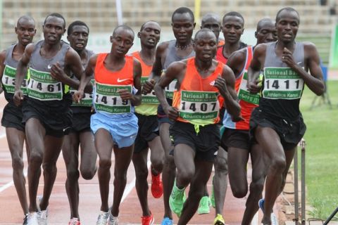 Edwin Soy Cheruiyot, of Kenya , front right, leads the pack  and went on to win in men's 1500 meters semi finals second heat during the National Trials for Olympic games  at Nyayo National Stadium, Nairobi, Kenya, Thursday, June 21, 2012 (AP Photo/Sayyid Azim)