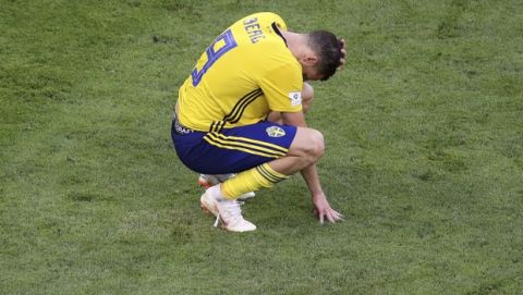 Sweden's Marcus Berg reacts at the end of the quarterfinal match between Sweden and England at the 2018 soccer World Cup in the Samara Arena, in Samara, Russia, Saturday, July 7, 2018. (AP Photo/Thanassis Stavrakis)
