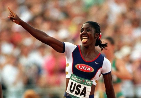 Gwen Torrence of the United States celebrates after she anchored the women's 4X100 meter relay team to a gold medal at the 1996 Summer Olympic Games in Atlanta, Saturday, August 3, 1996. (AP Photo/Denis Paquin)