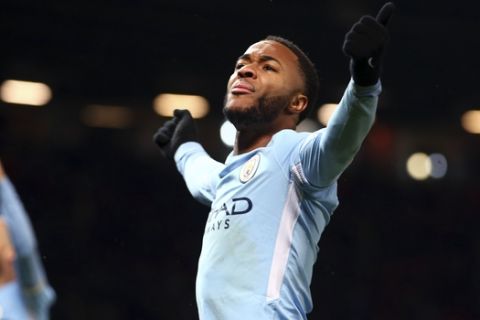 Manchester City's Raheem Sterling celebrates at the end of the English Premier League soccer match between Manchester United and Manchester City at Old Trafford Stadium in Manchester, England, Sunday, Dec. 10, 2017. City won 2-1. (AP Photo/Dave Thompson)