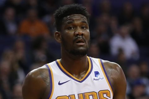 Phoenix Suns center Deandre Ayton (22) in the first half during an NBA basketball game against the Philadelphia 76ers, Wednesday, Jan. 2, 2019, in Phoenix. (AP Photo/Rick Scuteri)