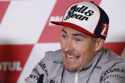 Nicky Hayden of the United States speaks during a press conference ahead of the MotoGP Japanese Motorcycle Grand Prix in Motegi, north of Tokyo,  Thursday, Oct.  8, 2015. (AP Photo/Shizuo Kambayashi)